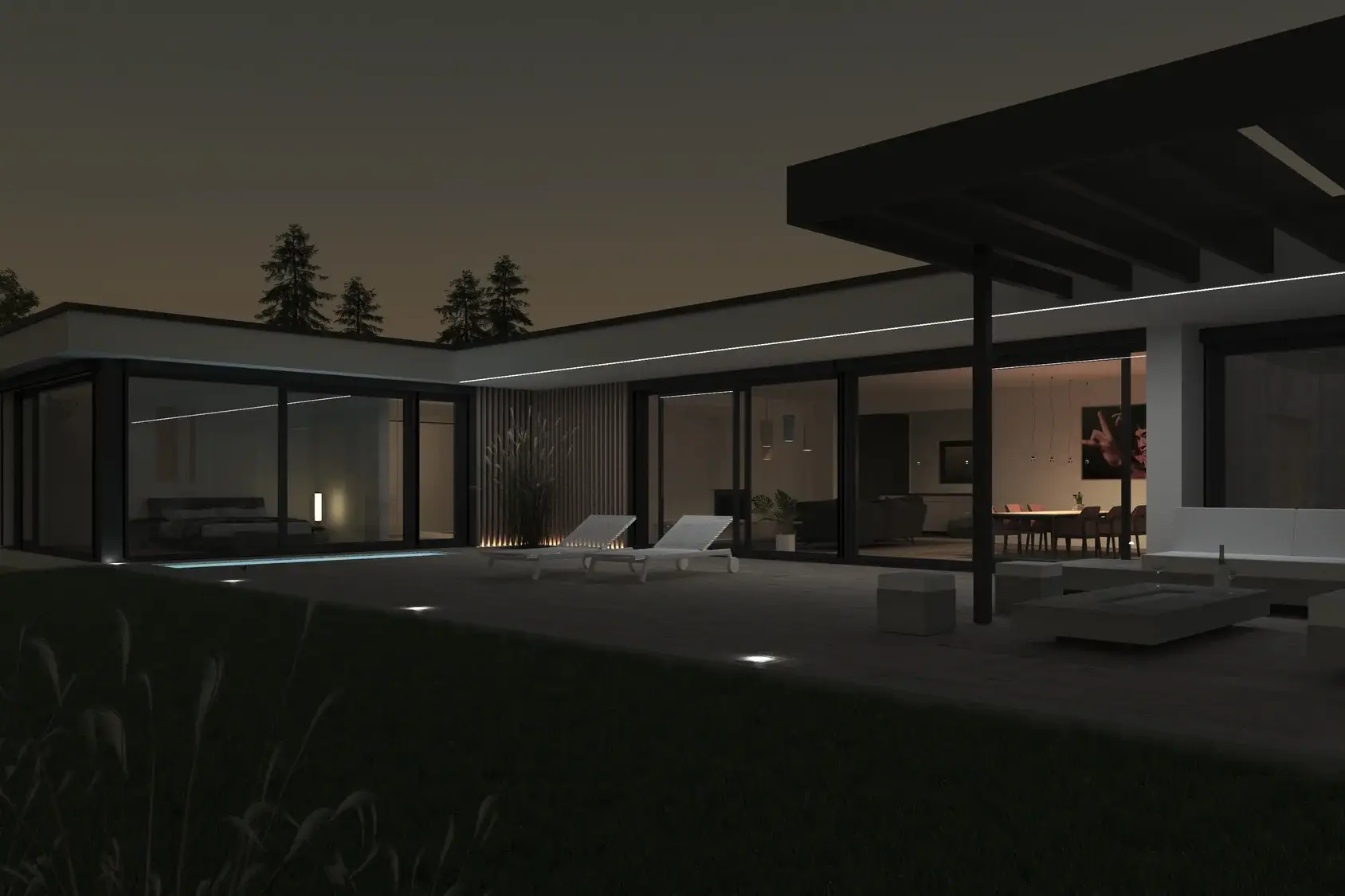 Umbau eines Bungalows in U-Form, Offenbach – Terrasse am Abend